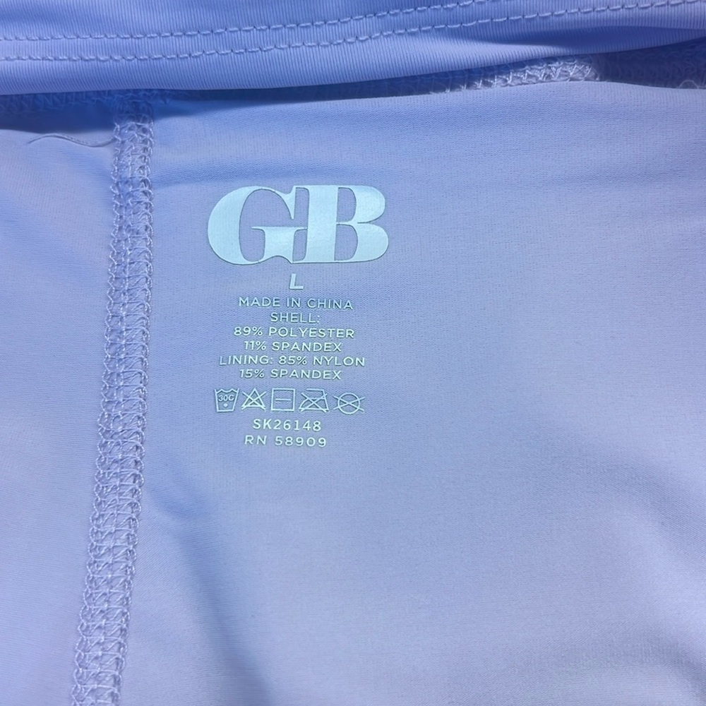 GB Sport Lilac skort. 2 side pockets on shorts under the skirt. Size L NWT - Picture 11 of 13